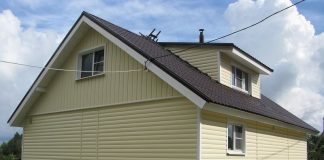 Отделка стен сайдингом в северном городе Тюмени