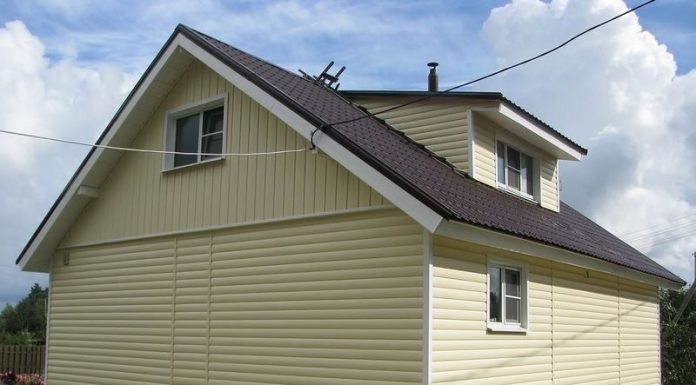 Отделка стен сайдингом в северном городе Тюмени