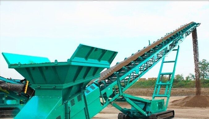 Гусеничный ленточный конвейер: ваш ключ к эффективной транспортировке материалов